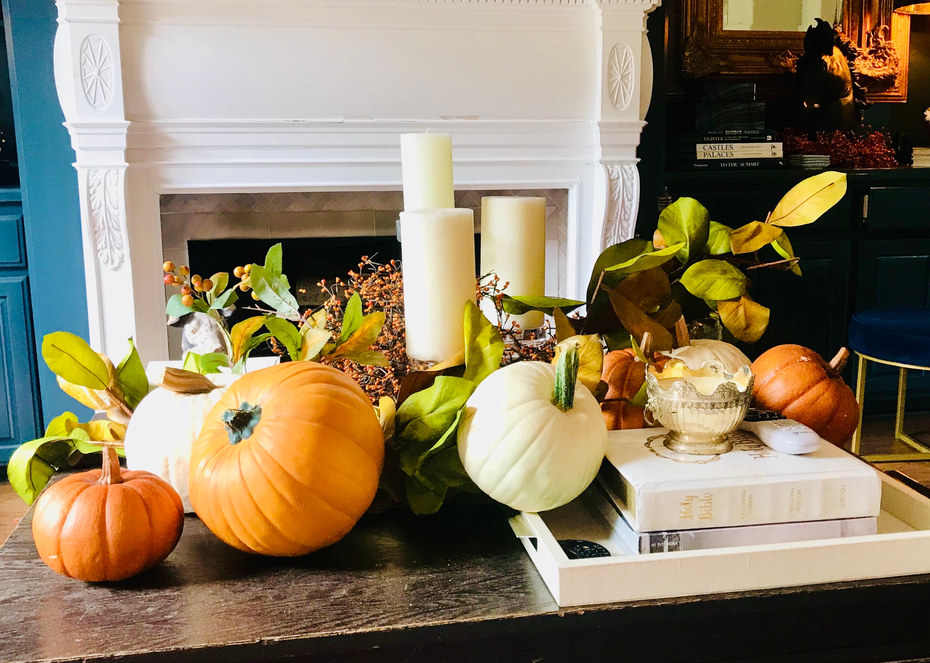 Autumn coffee table styling with pumpkins and candles